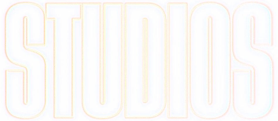 Large glowing neon text spelling STUDIOS with a colorful halo effect on a black background.