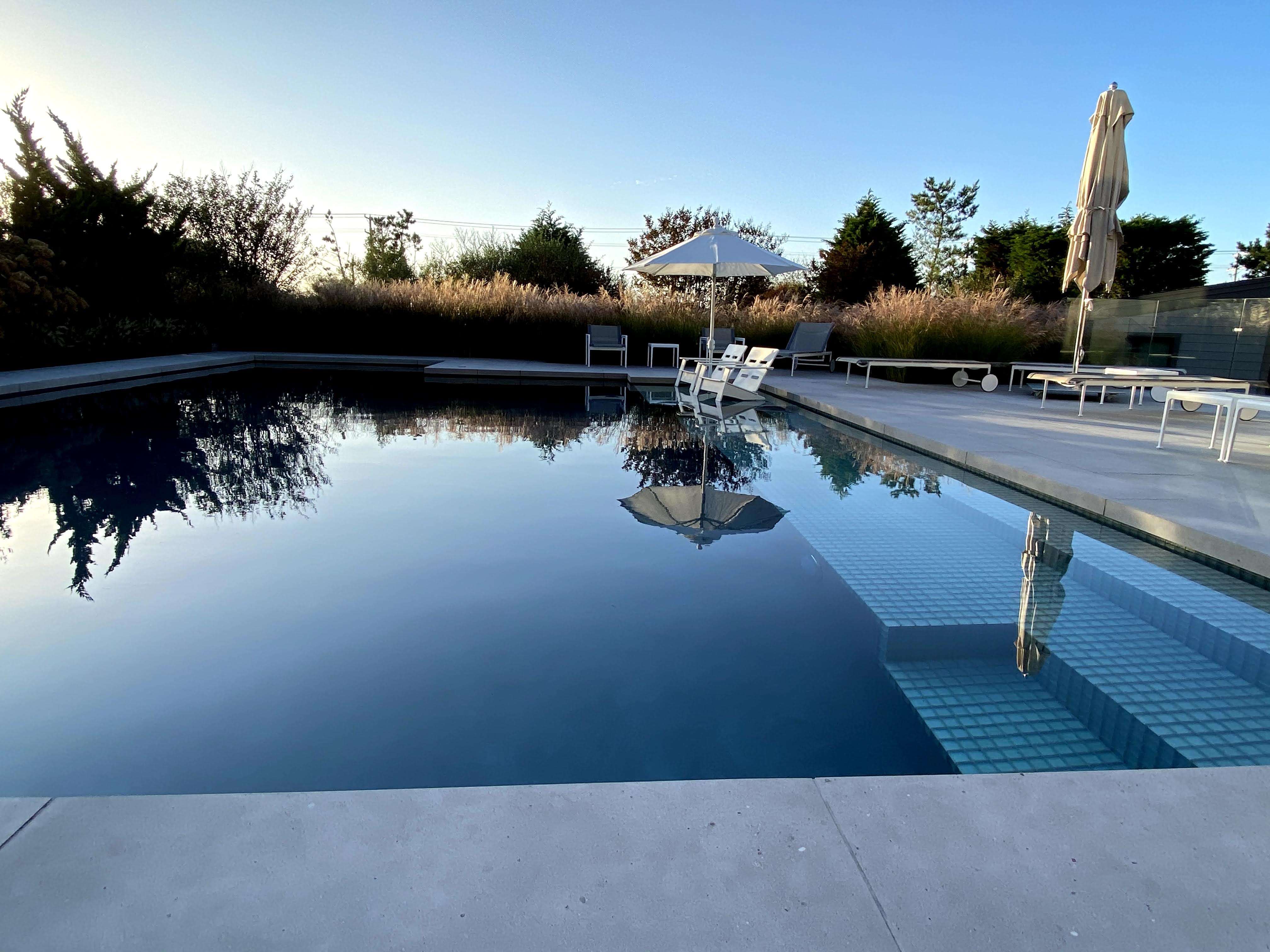 Sunlit terrace with calm water plane, Loveladies, NJ