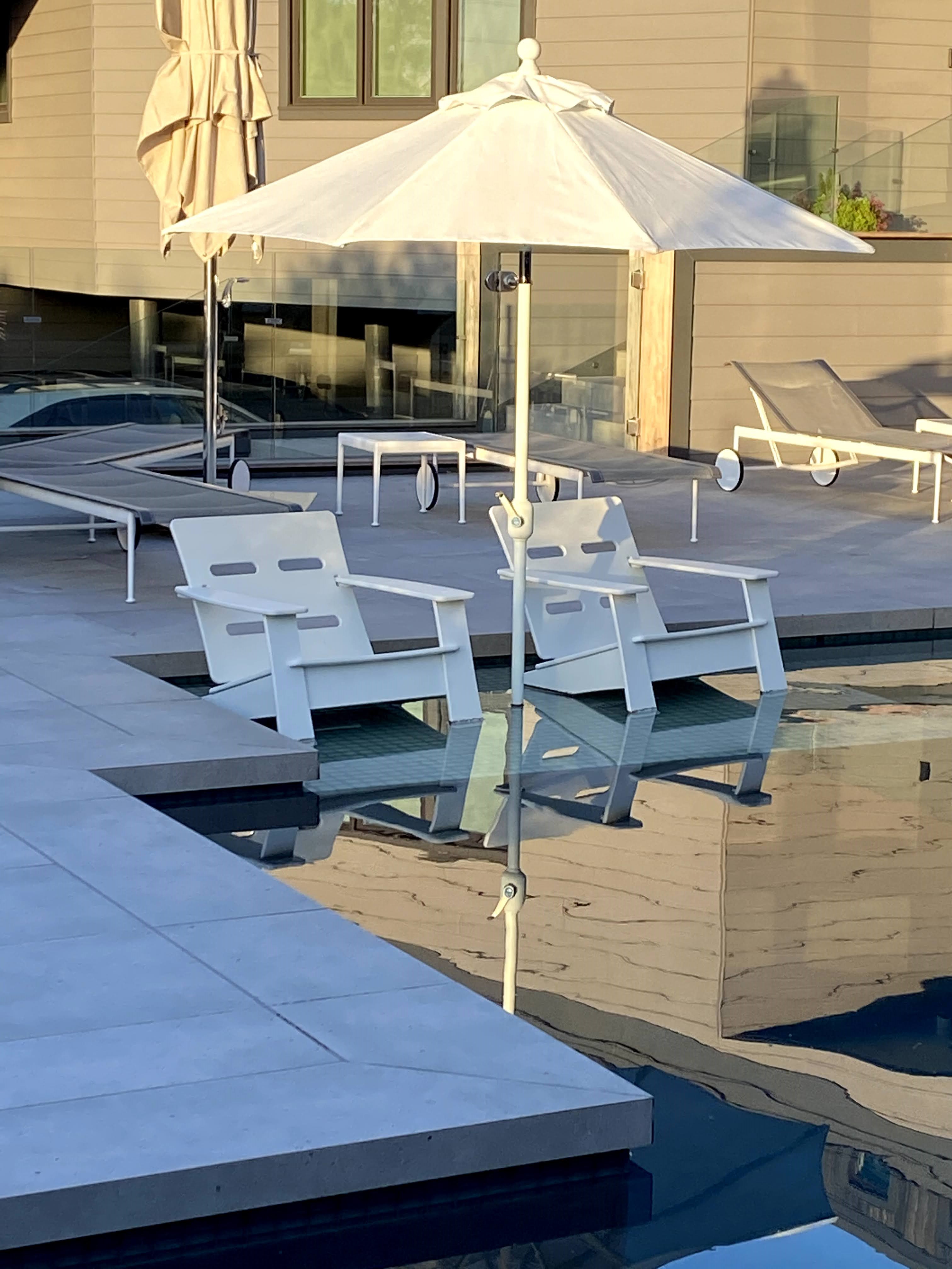 Covered lounge beside modern pool, Loveladies, NJ