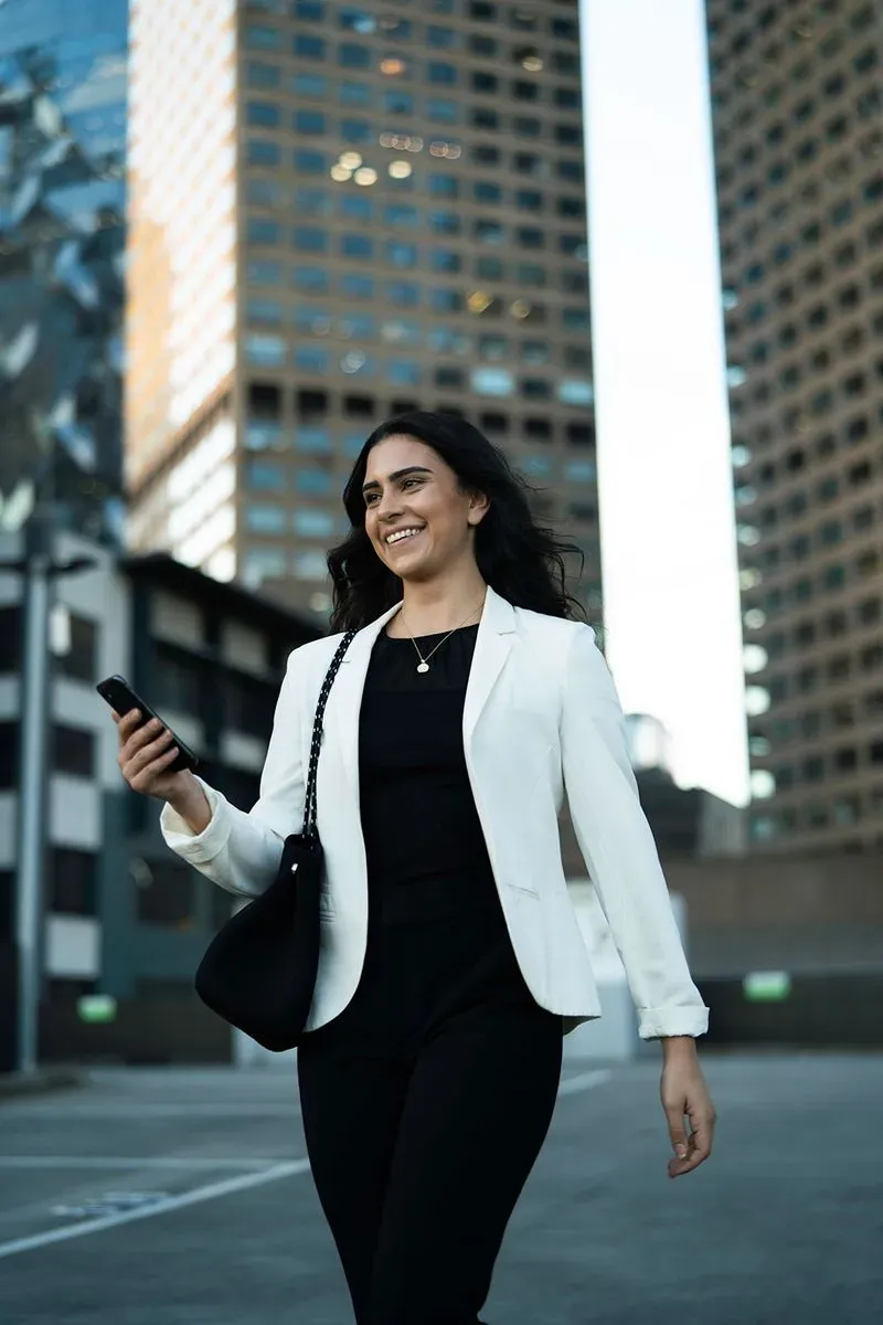 lady on which coat holding mobile