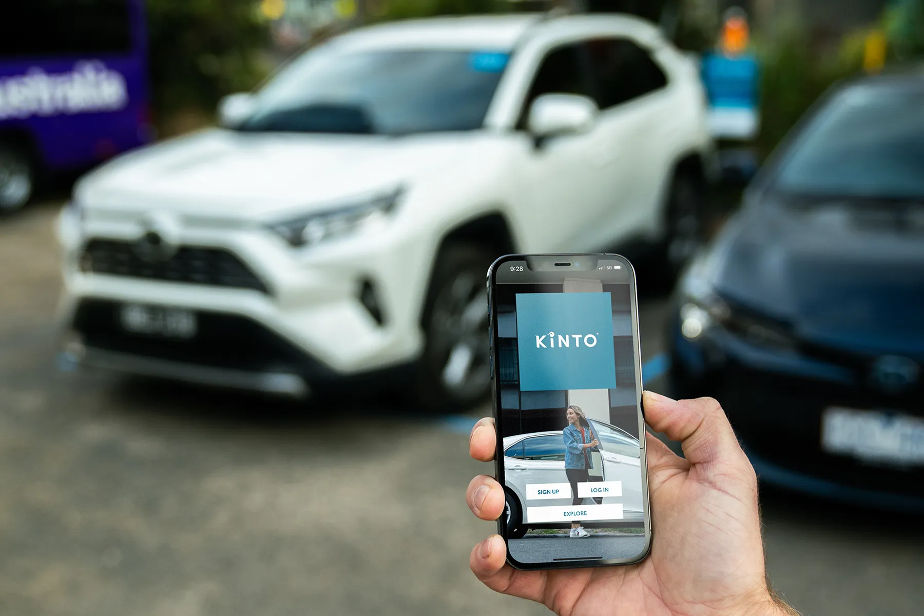 KINTO RAV4 Urban Casual man holding phone image KINTO car rental