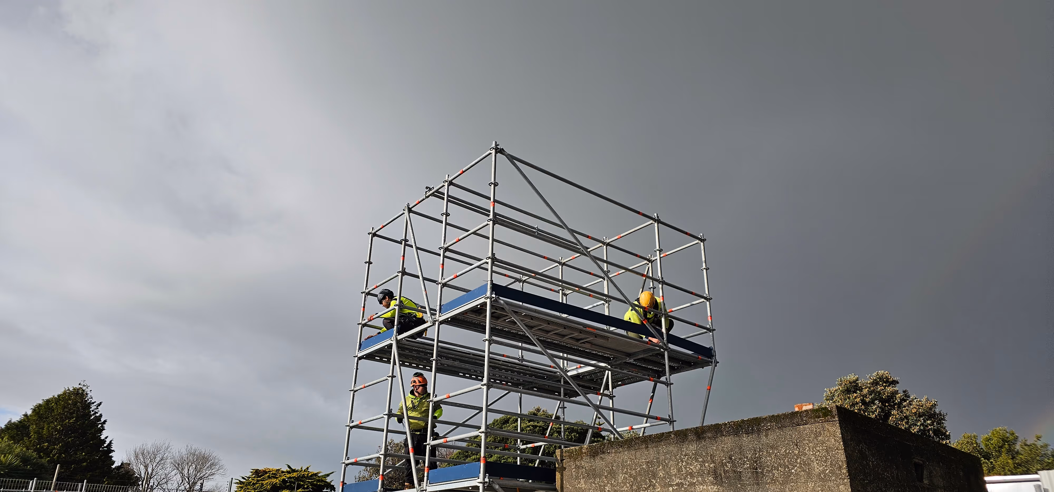 The Barred Up Scaffolding team setting to a scaffolding platform