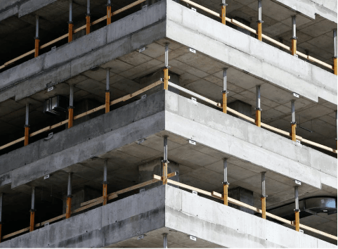 A tall building with a bunch of windows.