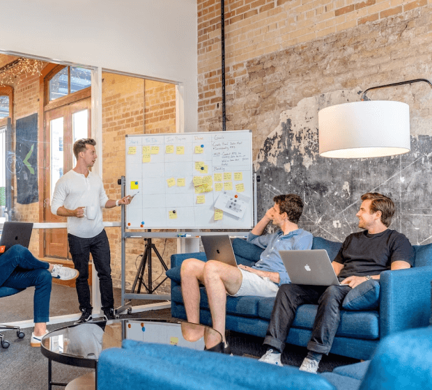A man giving a presentation to a group of people.