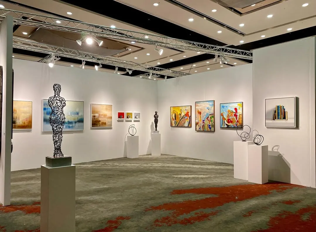 Interior view of George Billis Gallery featuring paintings and sculptures