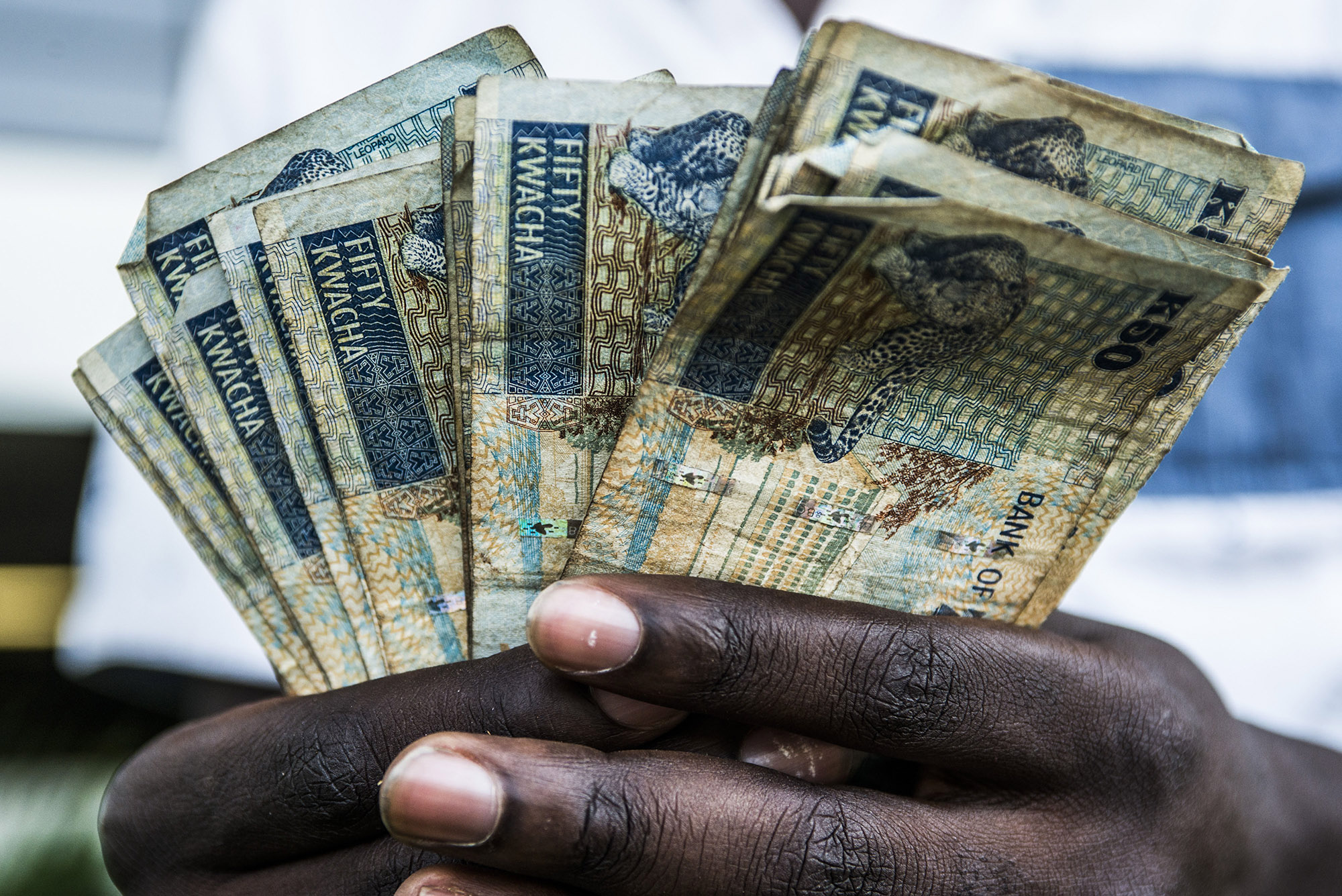 Cedi, kwacha weaken on persistent dollar demand; East African currencies steady