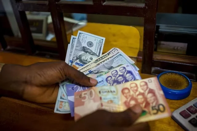 Ghanaian and Zambian currencies seen under pressure