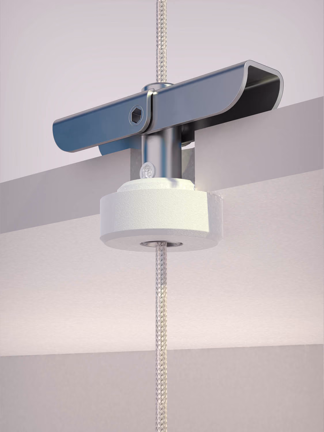 Close-up of a metal clamp securing a white circular piece to a vertical rope between two panels.