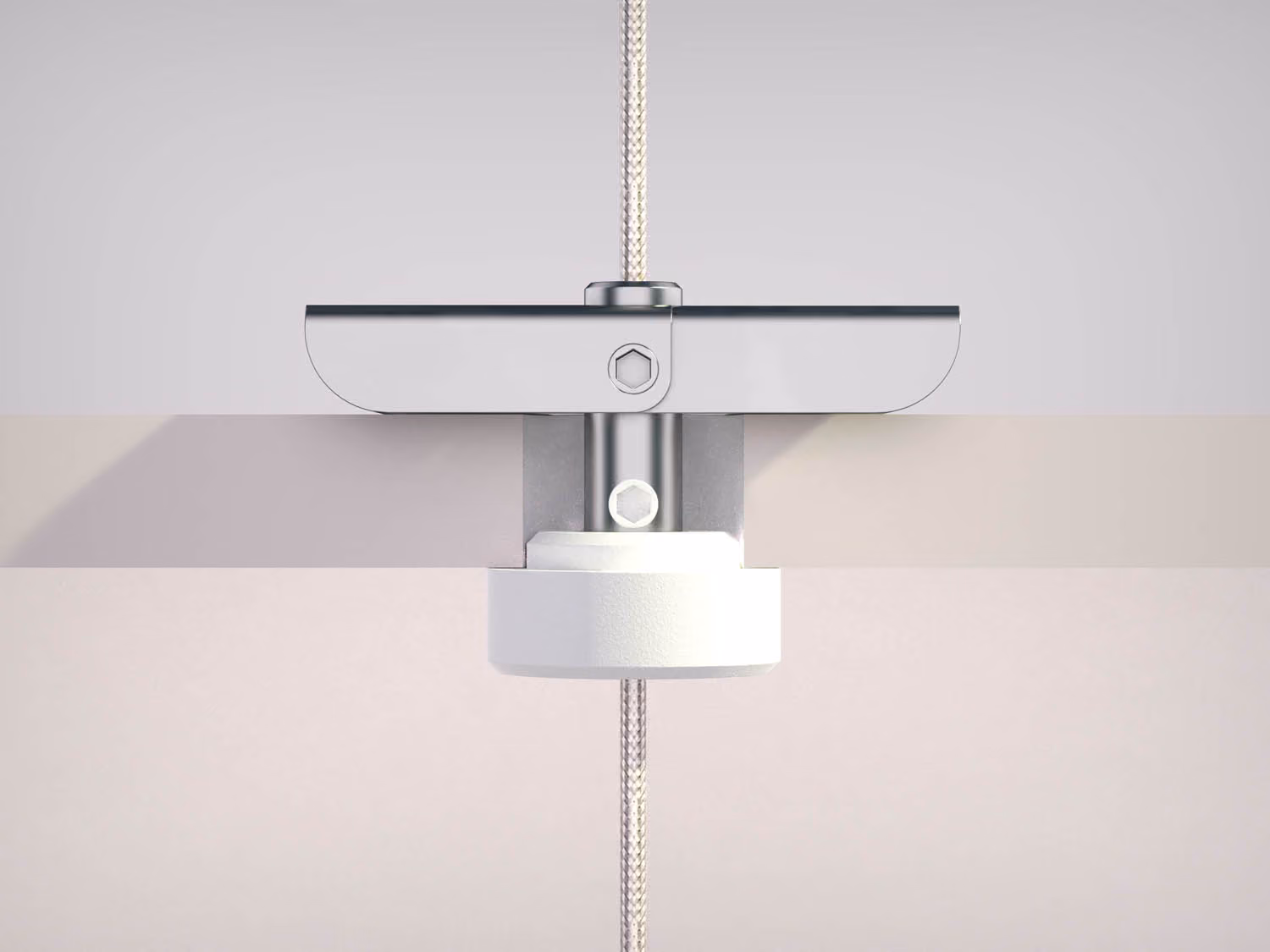 Close-up of a metal clamp securing a panel with a rope running through it.