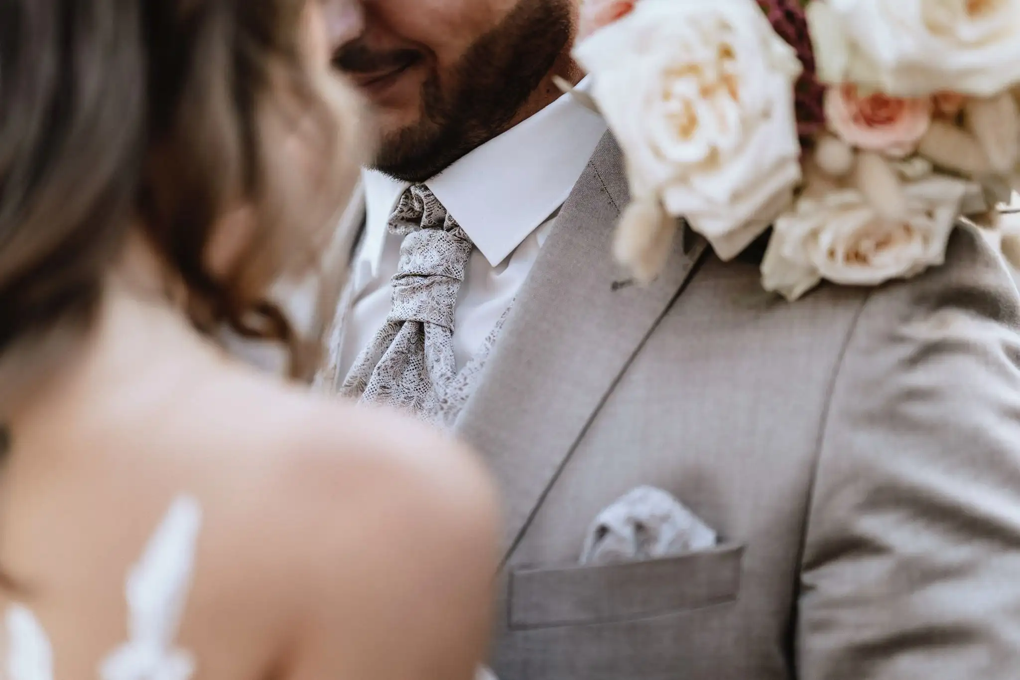 man and woman hugging