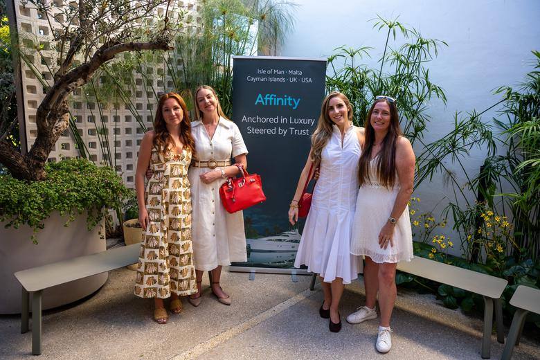 Guests with the Affinity banner at an A305 gathering