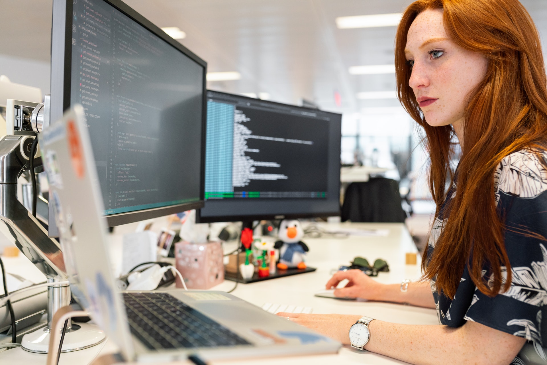 Woman coding on computer