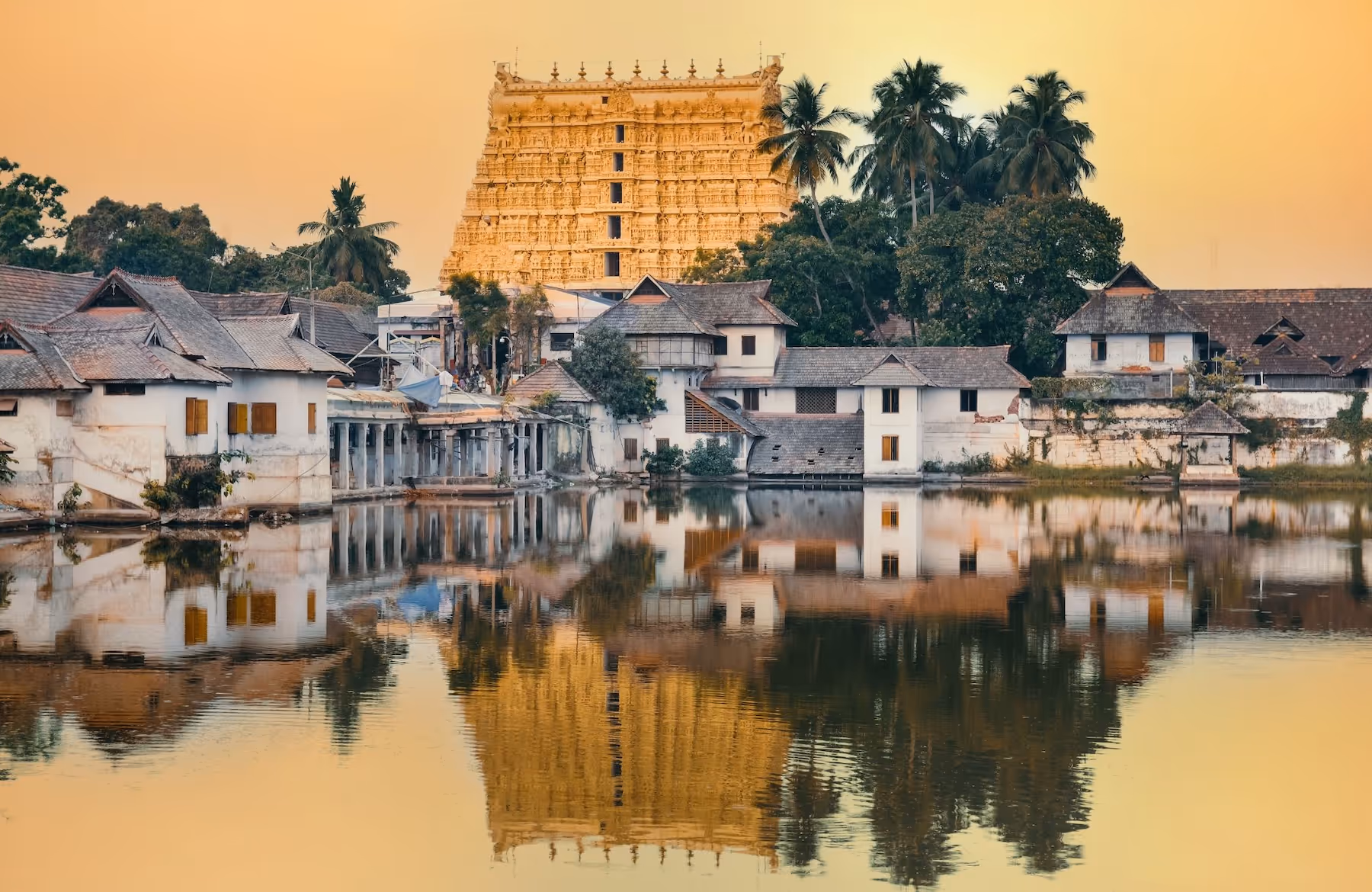 gap year india volunteering abroad kerala town buildings reflected on water