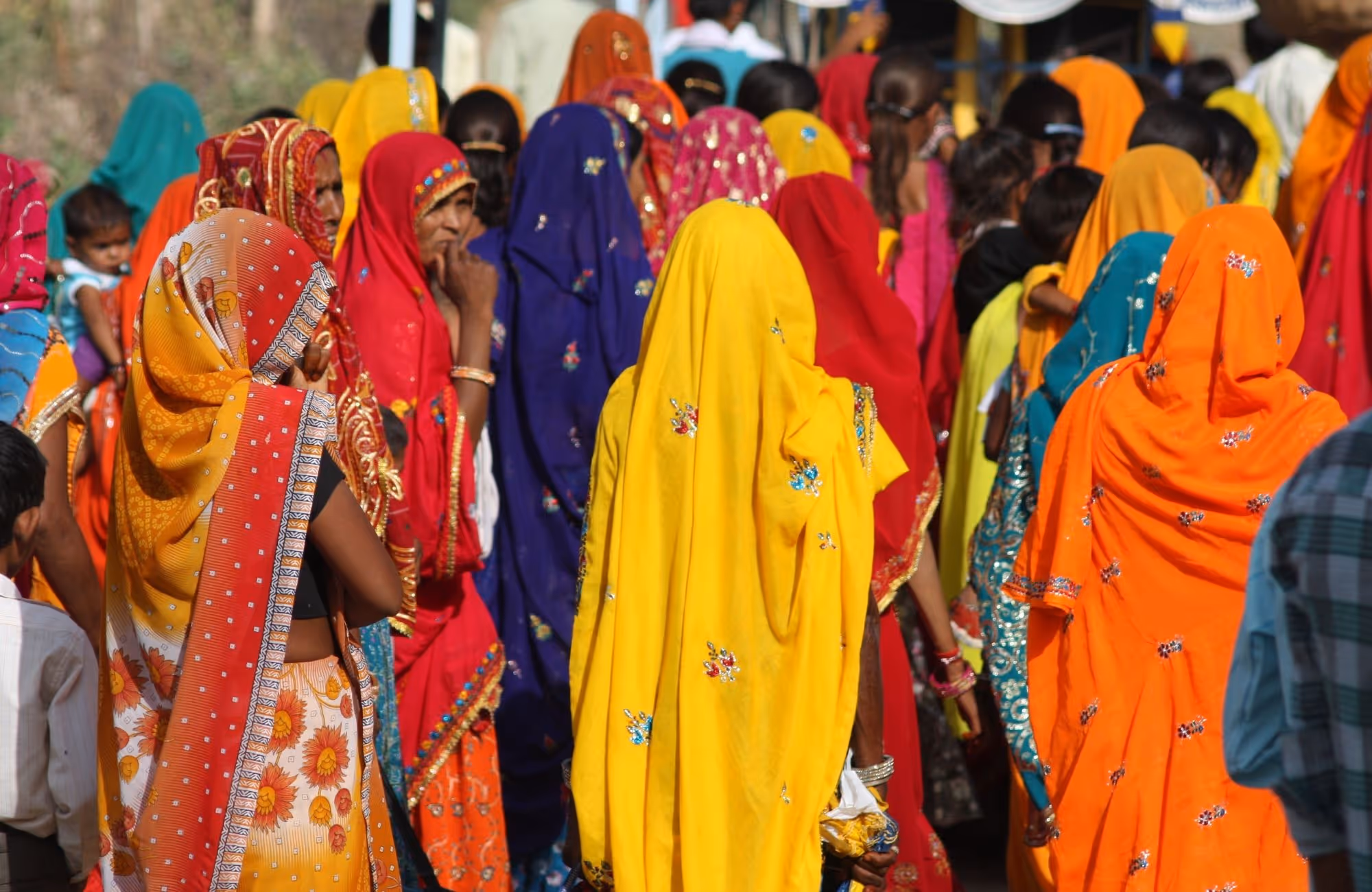 gap year india volunteering abroad ladies in colourful sahris in town