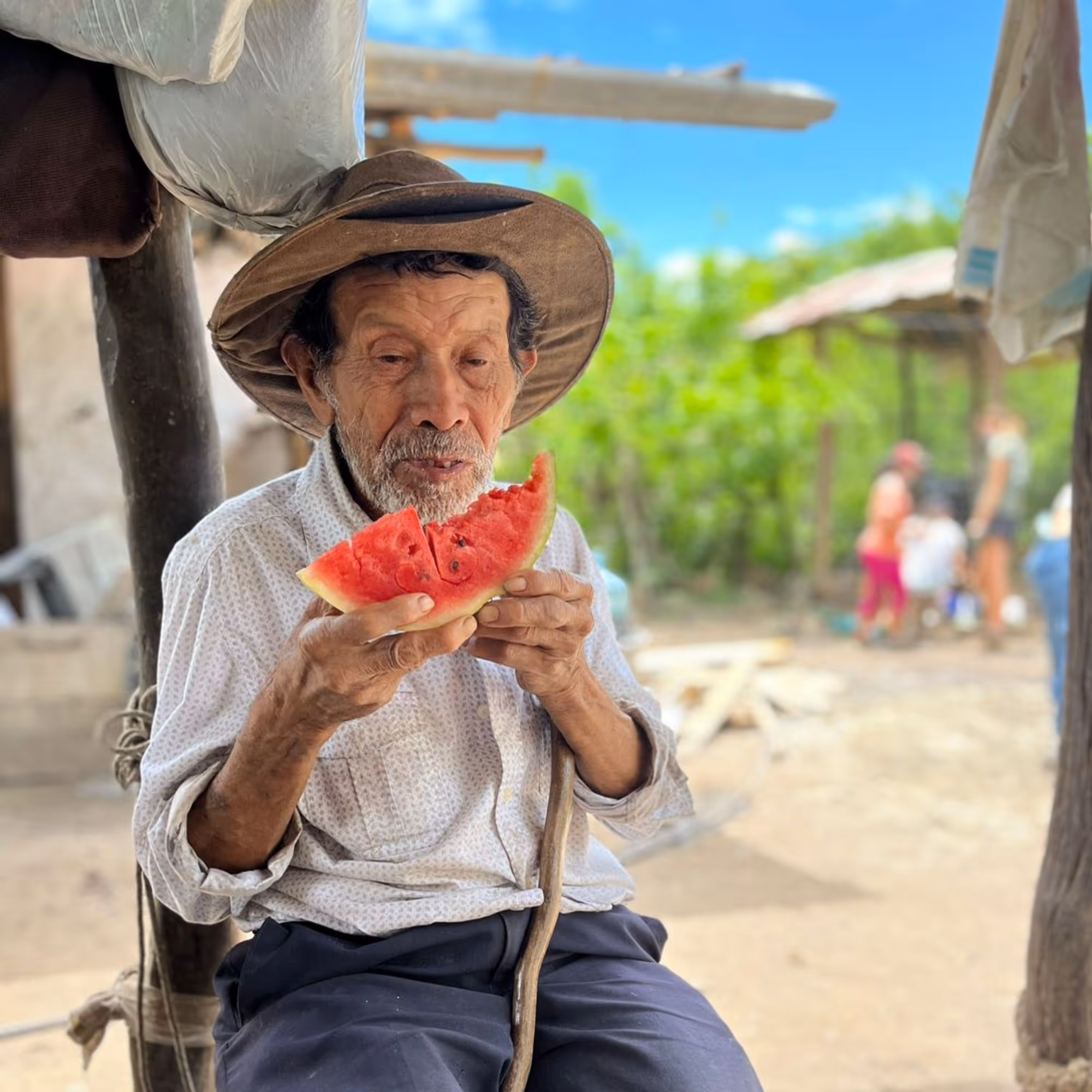 gap year volunteering abroad colombia man eating watermelon