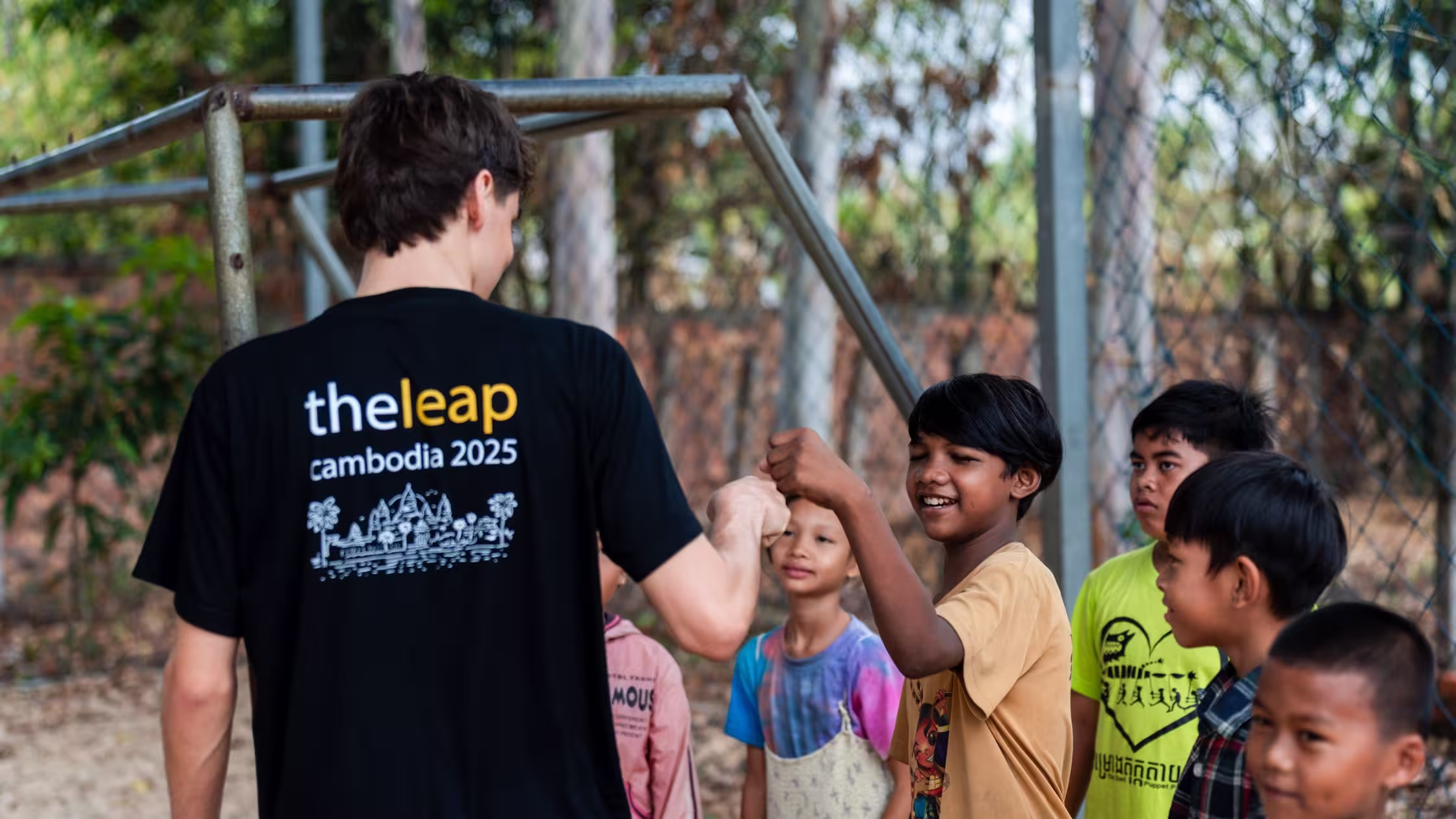 Leap student interacting with cambodian school kids