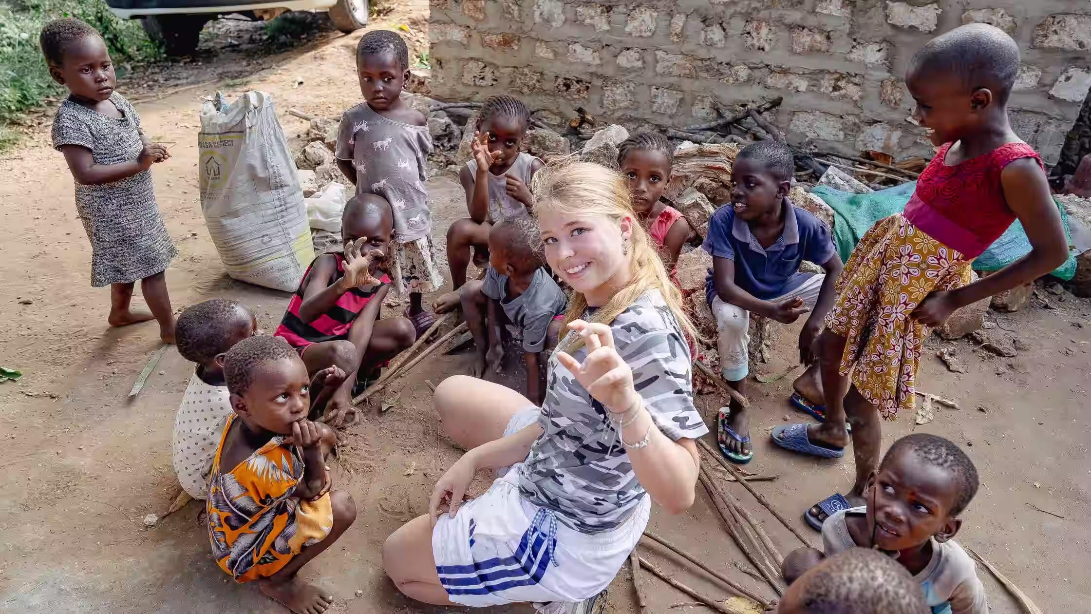 international volunteering diploma kenya student playing with african kids