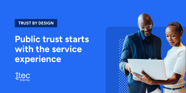 "Trust by design" over two people looking at a laptop screen together. 