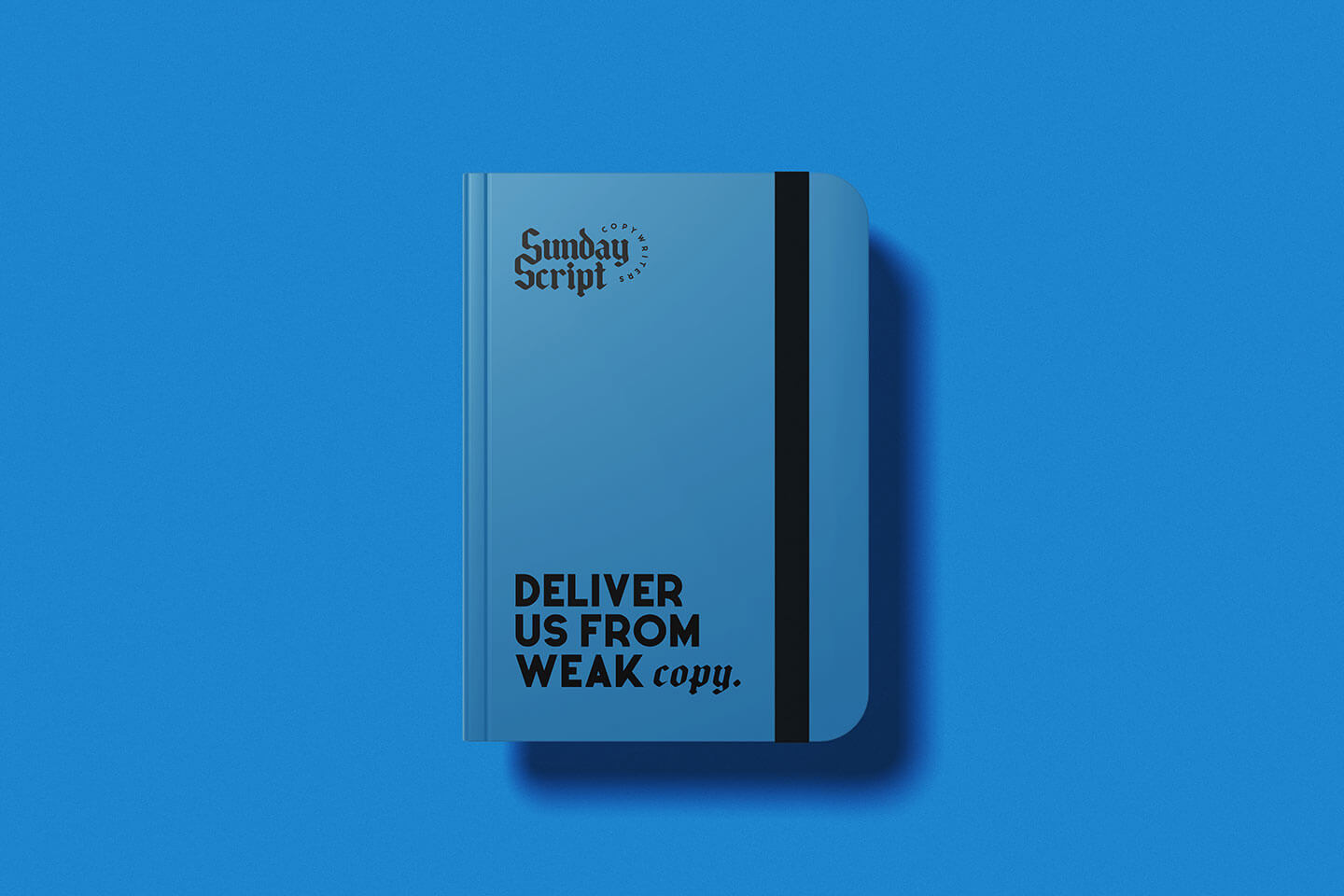 A bright blue Sunday Script notebook on a bright blue background