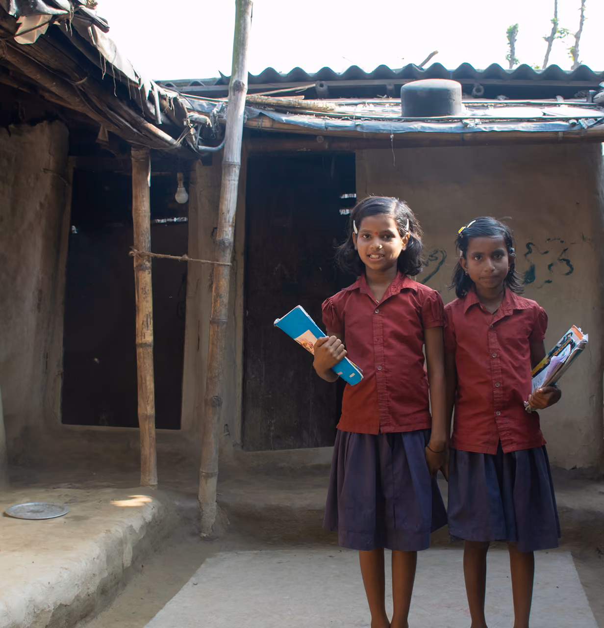 2 Indian Girls in school uniform