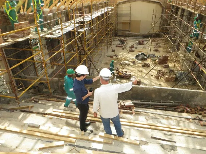 Two workers at construction site.