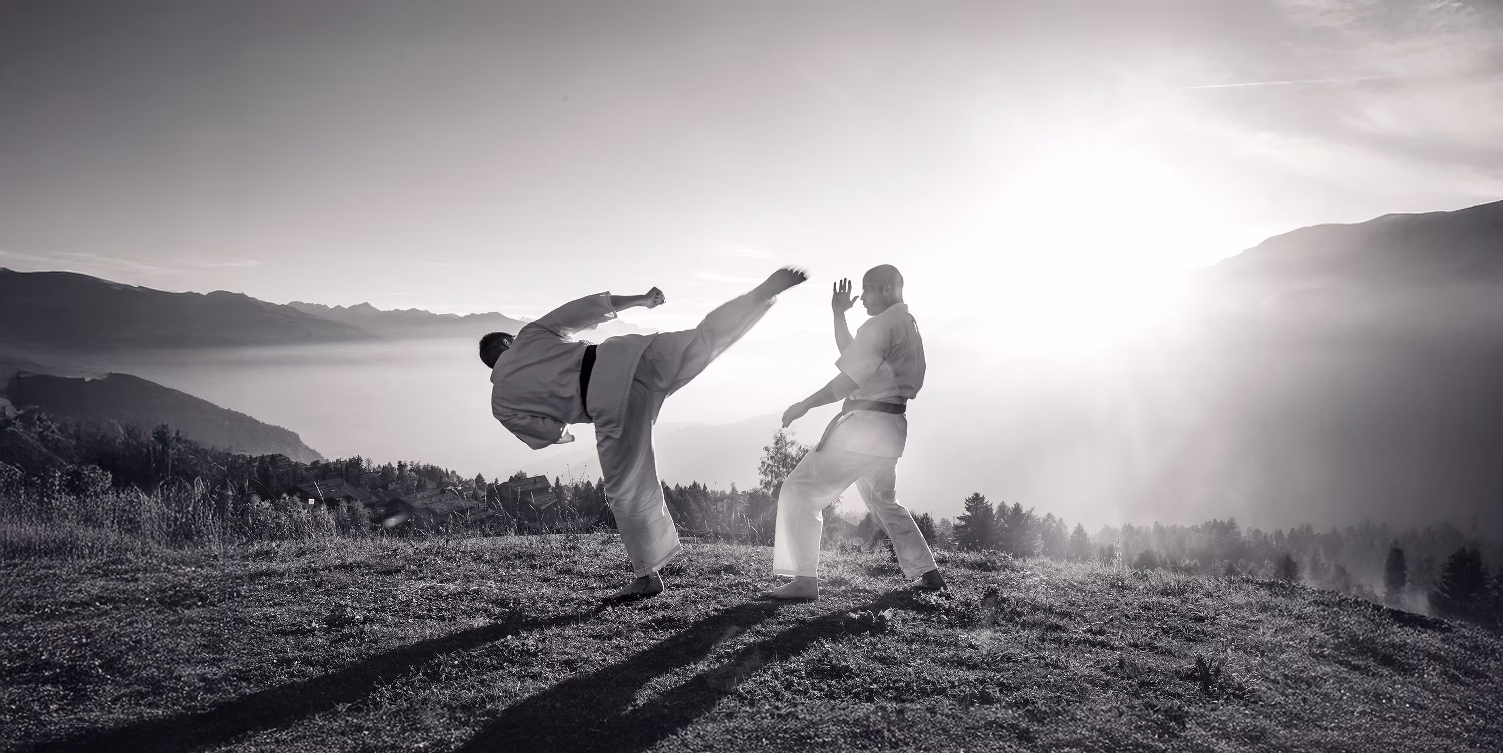 Two men doing Karate in the Swiss Alpes, Crans-Montana
