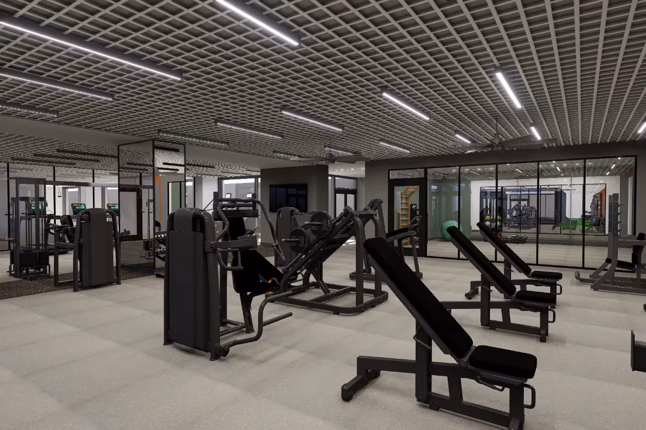 Comprehensive fitness center with a variety of strength training and cardio machines, offering modern workout facilities at Continental Tower in Columbus, Ohio.