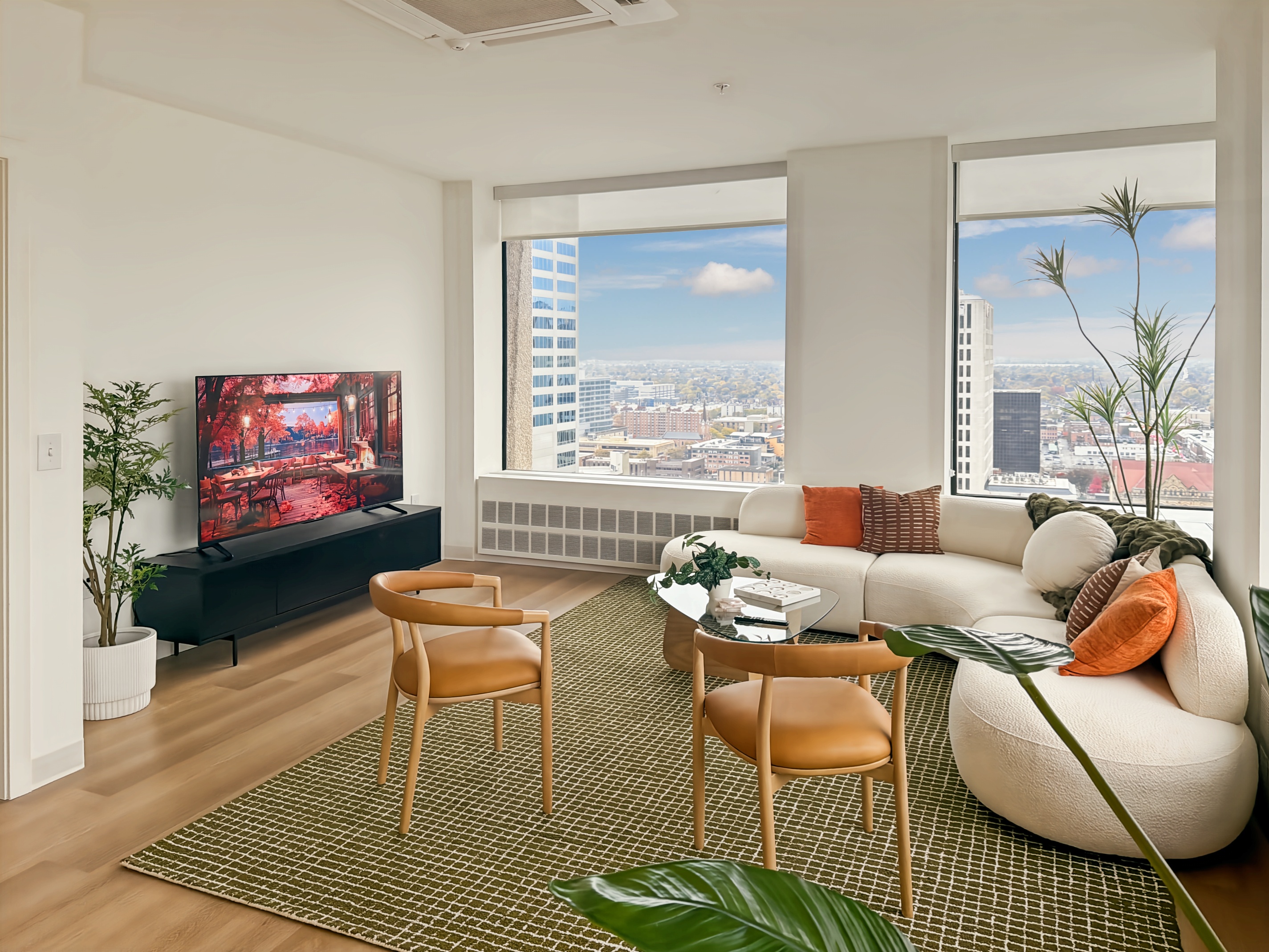 Elegant and expansive resident lounge with diverse seating, high ceilings, and modern design, characteristic of Continental Tower in Columbus, Ohio