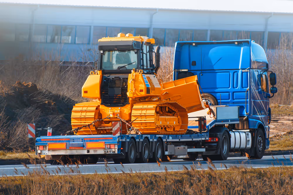 truck transporting large equipemnt