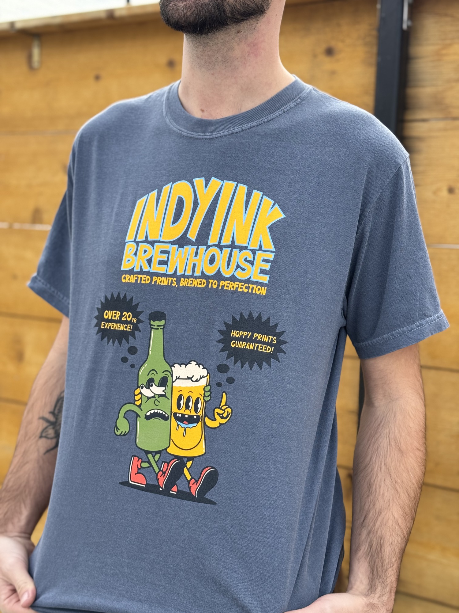IndyInk Brewhouse Tee - cartoon beer characters on blue-grey washed blank