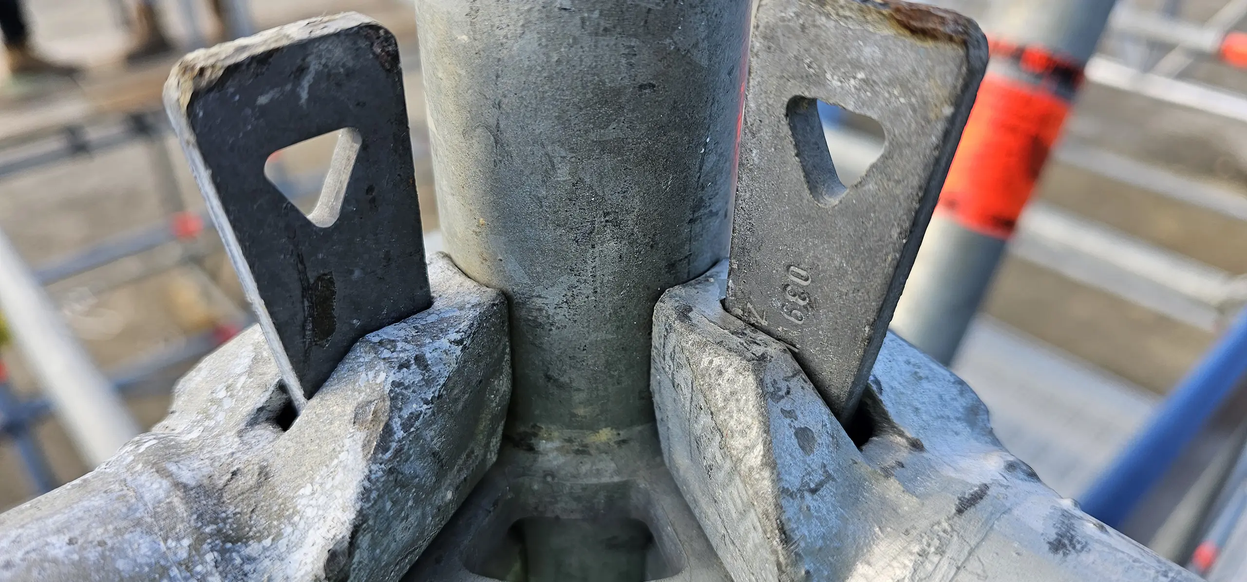 Close-up of Barred Up Scaffolding interconnected scaffolding poles and clamps showing structural detail and safety features