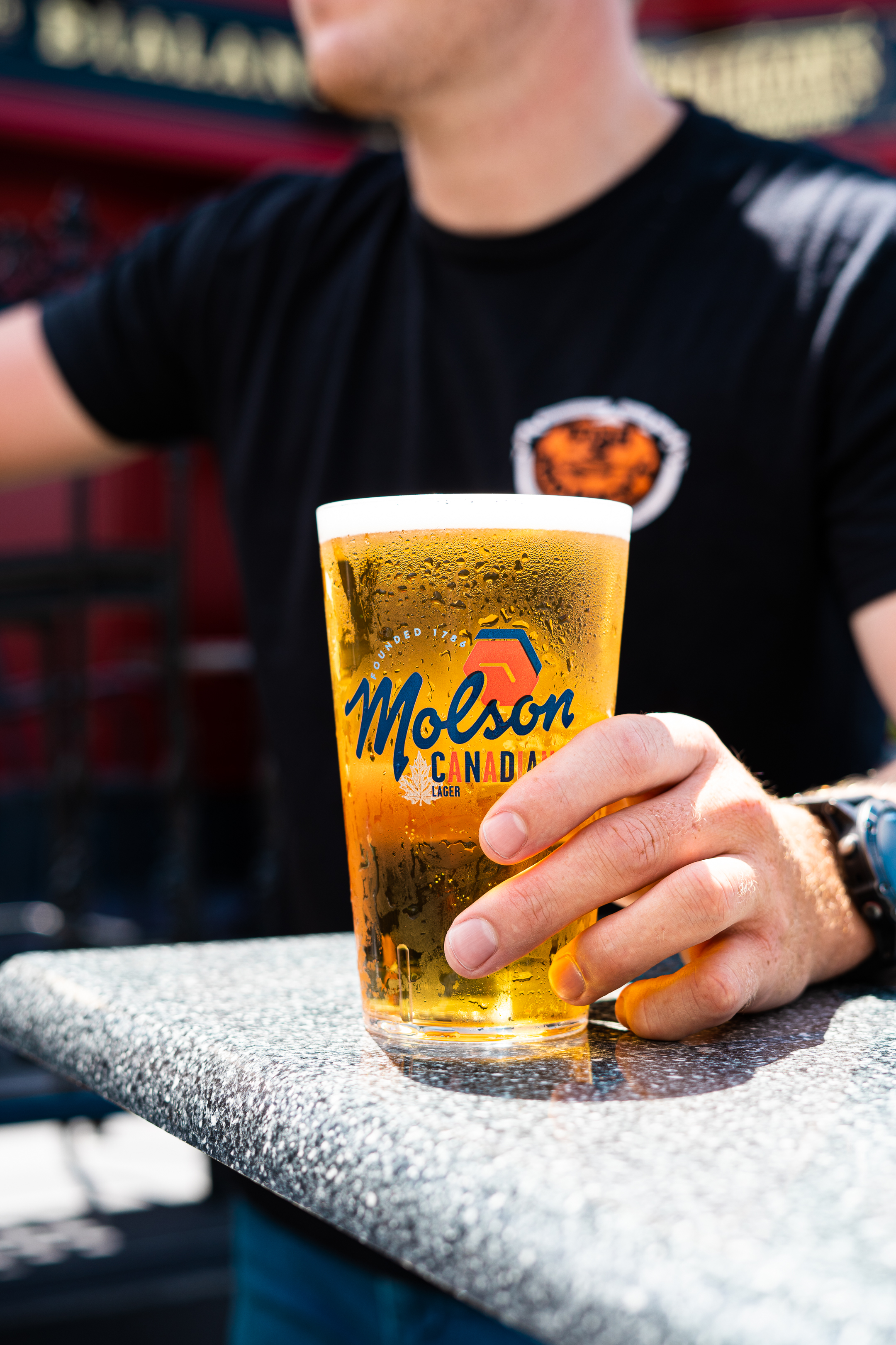 Thin pizza coming out from the oven