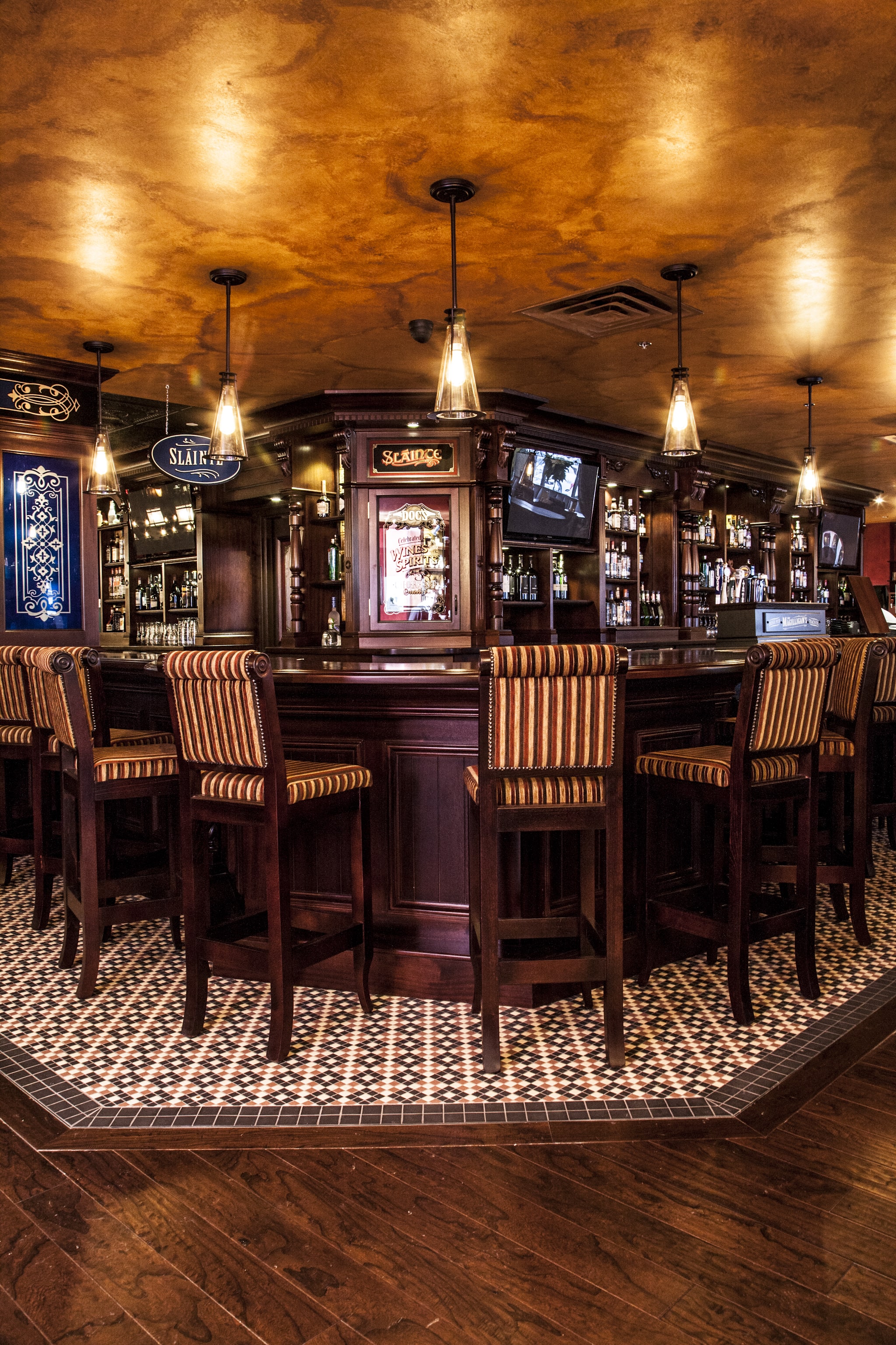 Chef placing cheese on raw pizza bread