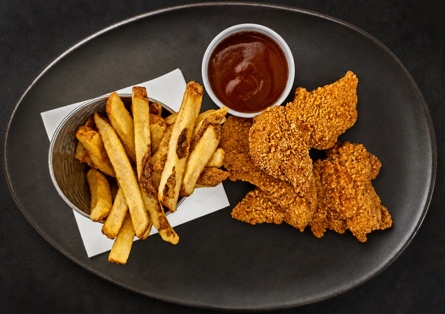 Doc's chicken strips with fries and plum sauce