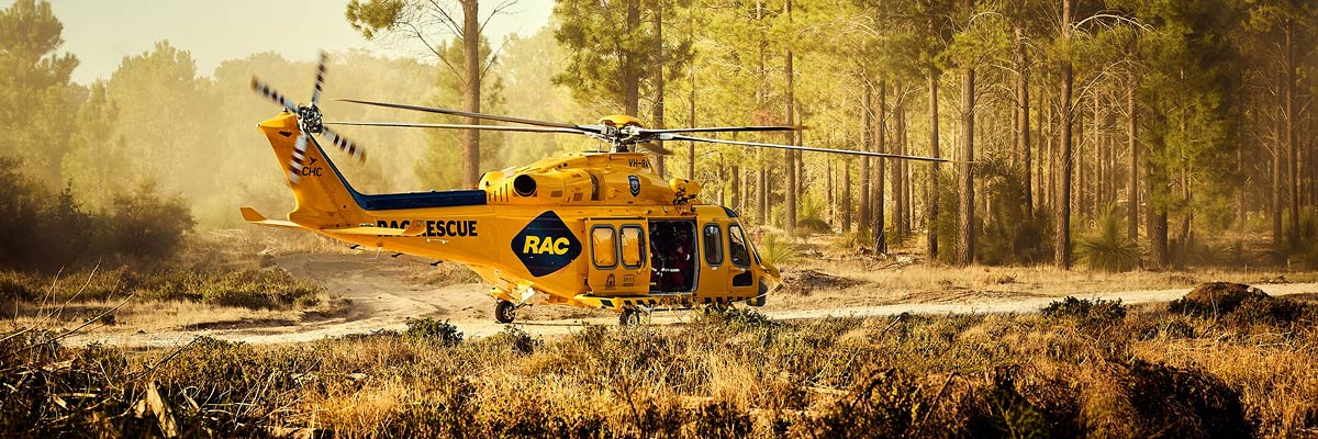 RAC Rescue Helicopter landed, surrounded by bushland