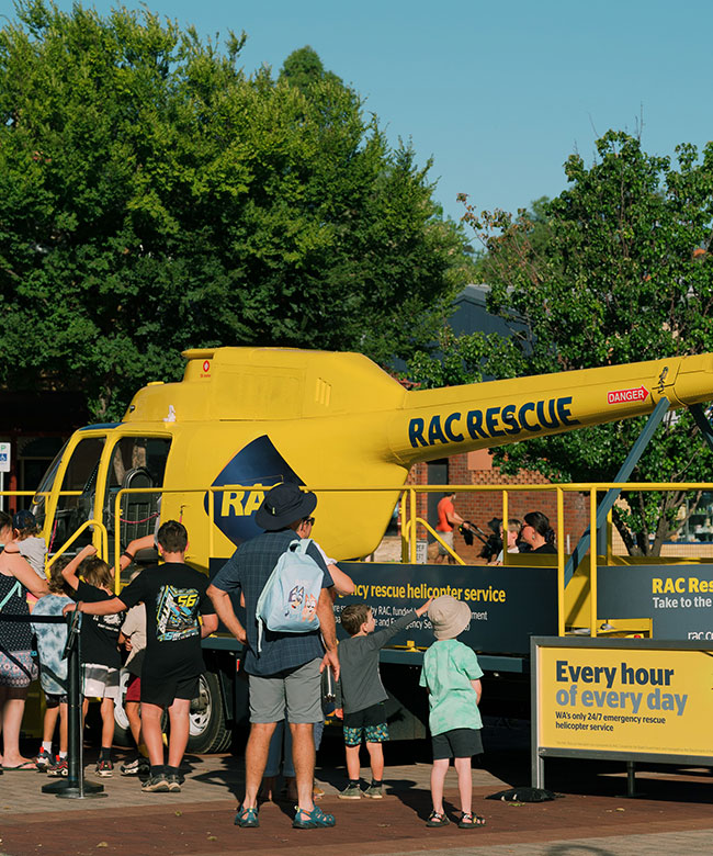 Families enjoy the RAC Rescue experience, a virtual reality community activation