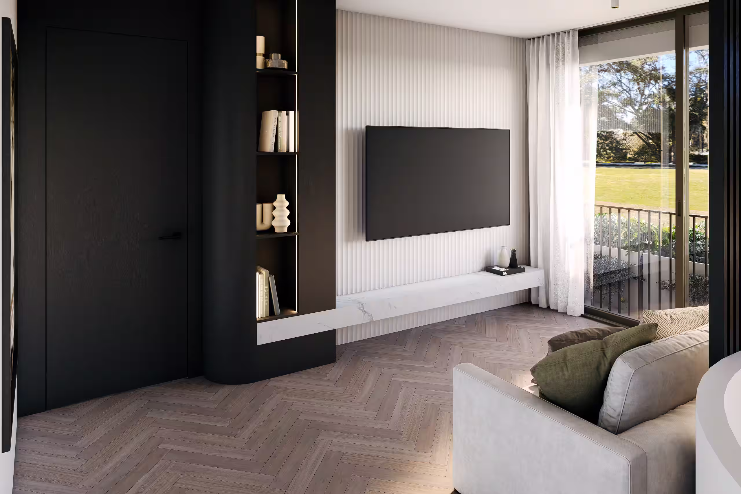 Modern living room with a wall-mounted flat screen TV, white floating shelf, built-in black shelving with books and vases, light wood herringbone floor, and a sliding glass door opening to a green outdoor space.