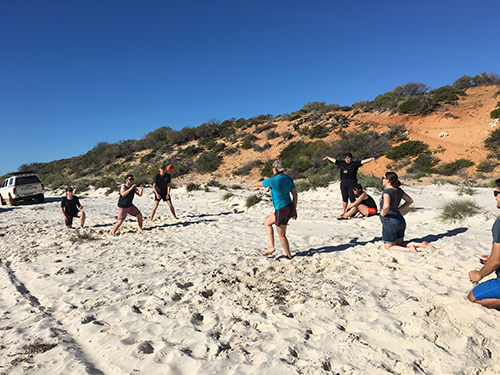 YWAM Perth 4-Wheel Drive DTS students enjoying team activities on the beach during an Australian adventure.