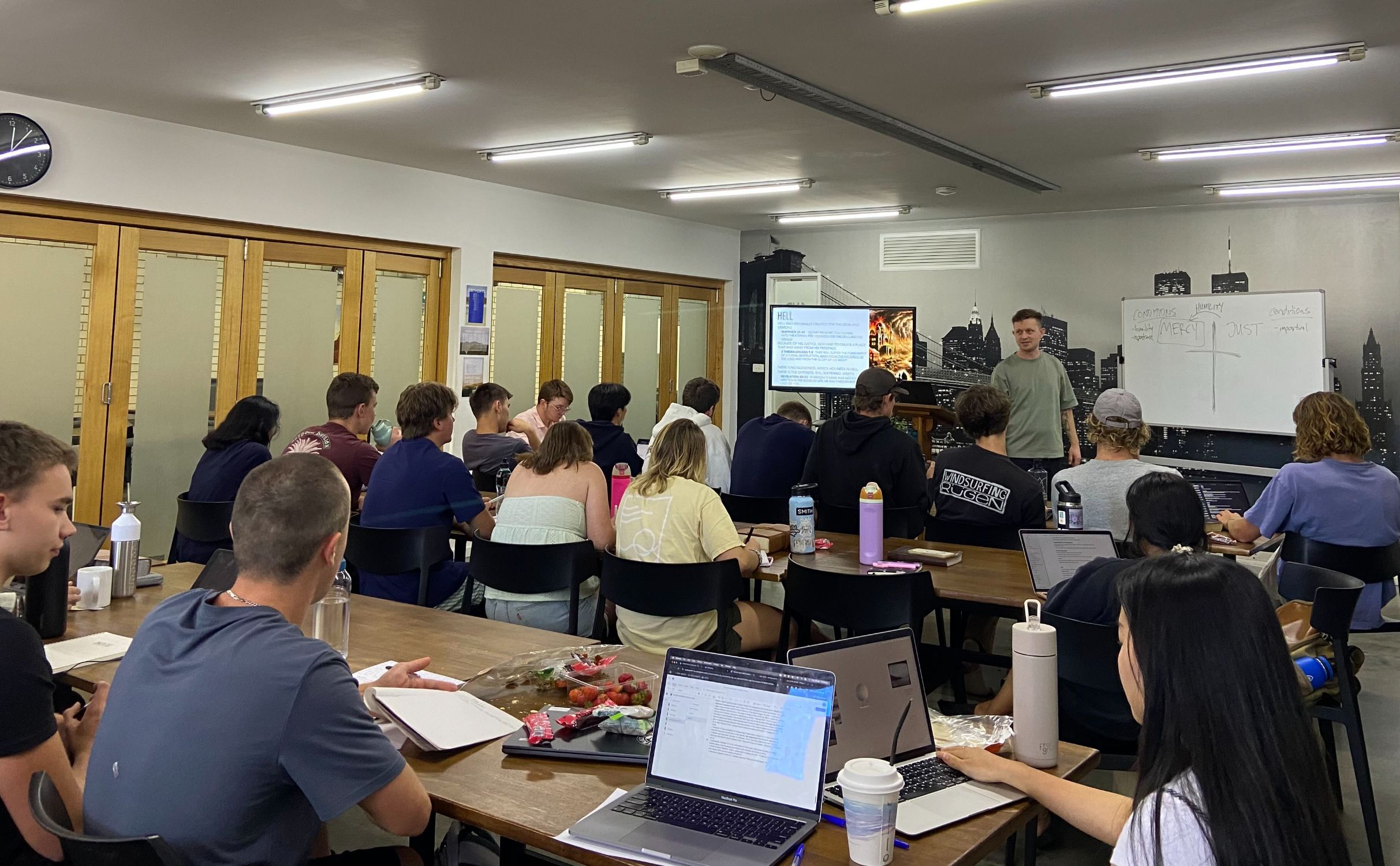 YWAM Perth Outback DTS students in class learning biblical foundations and discipleship principles.
