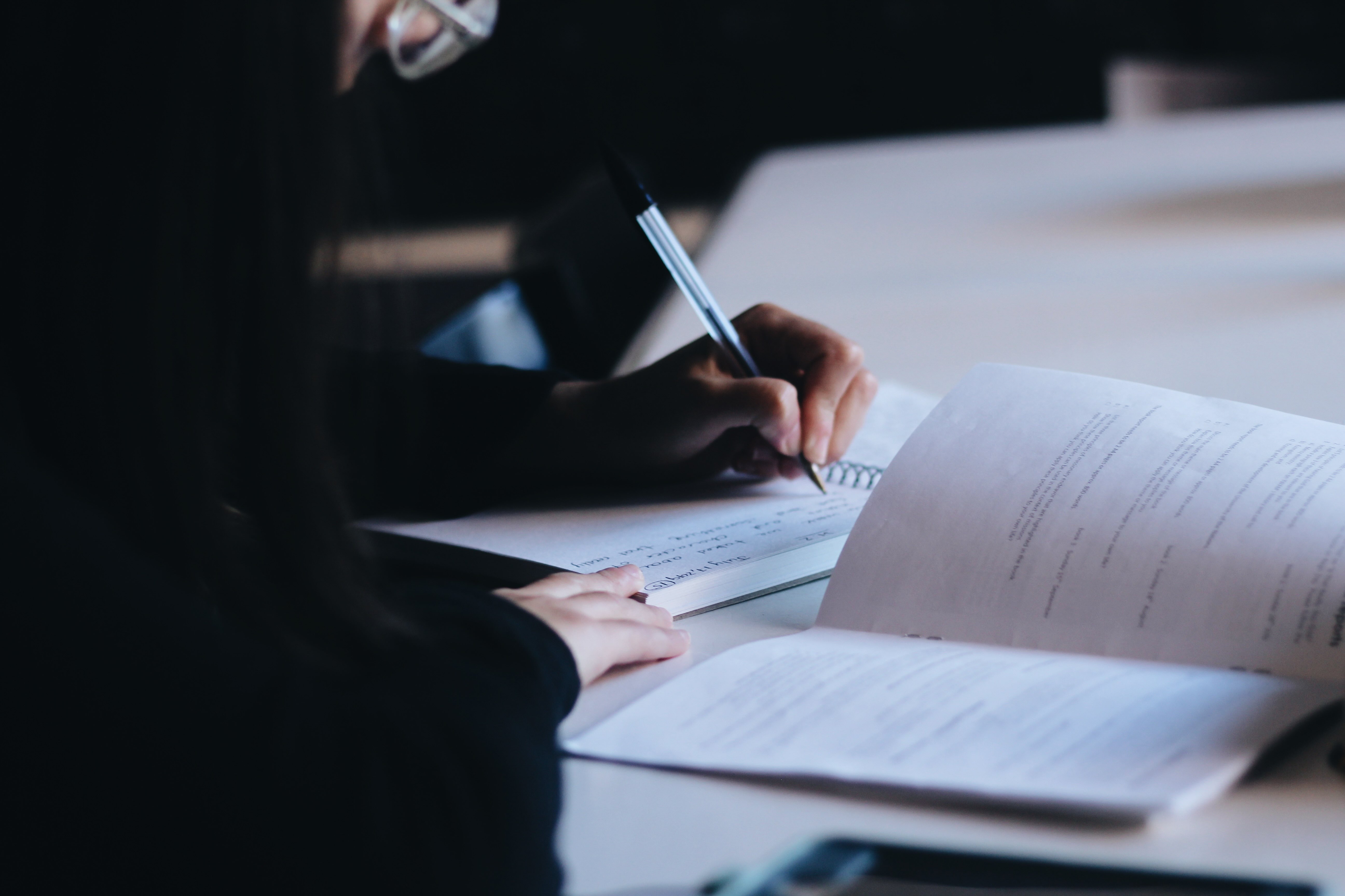 someone studies the Bible with resources