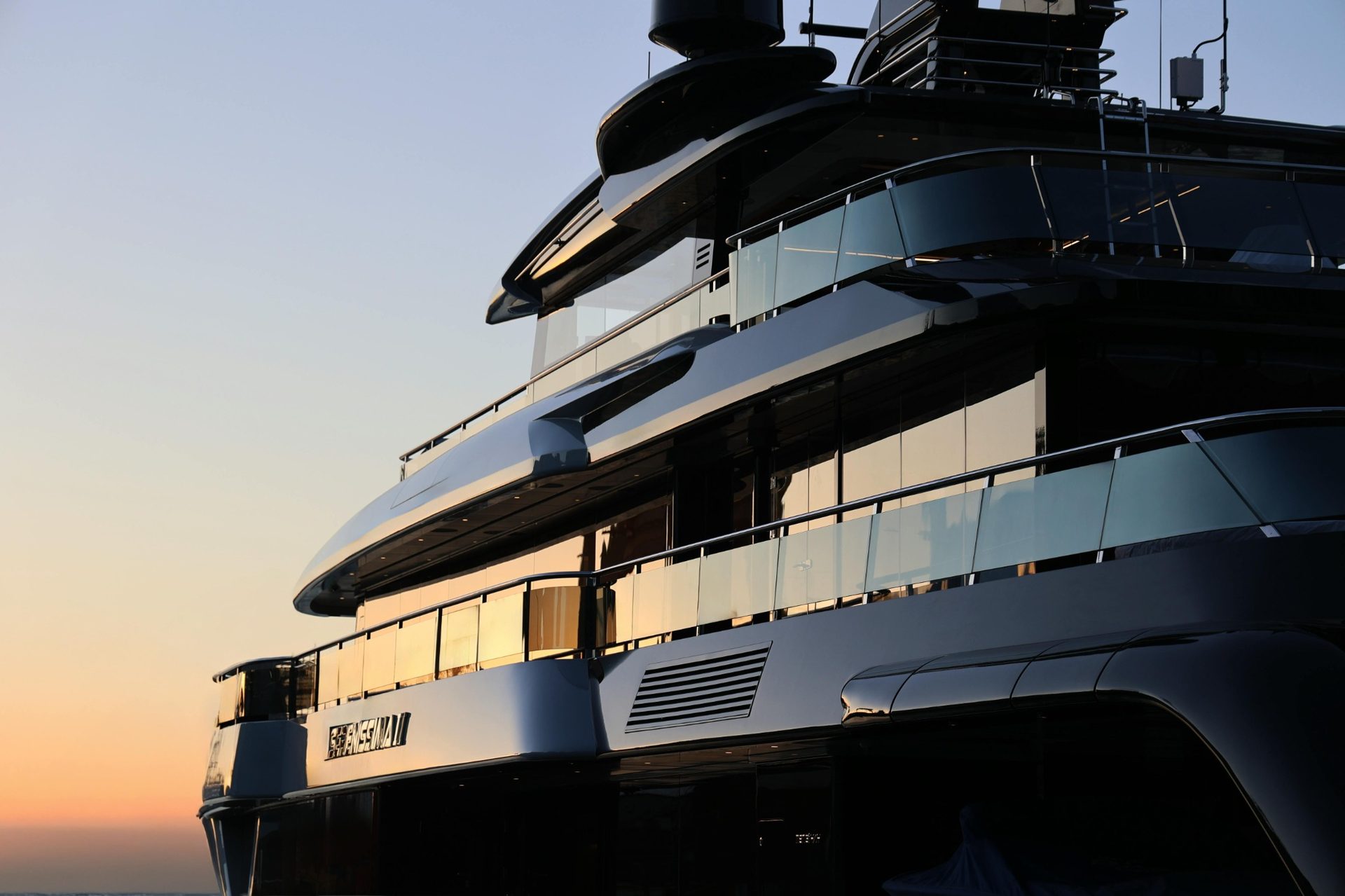 Luxury superyacht exterior at sunset, representing Montclair Chef private yacht chef services