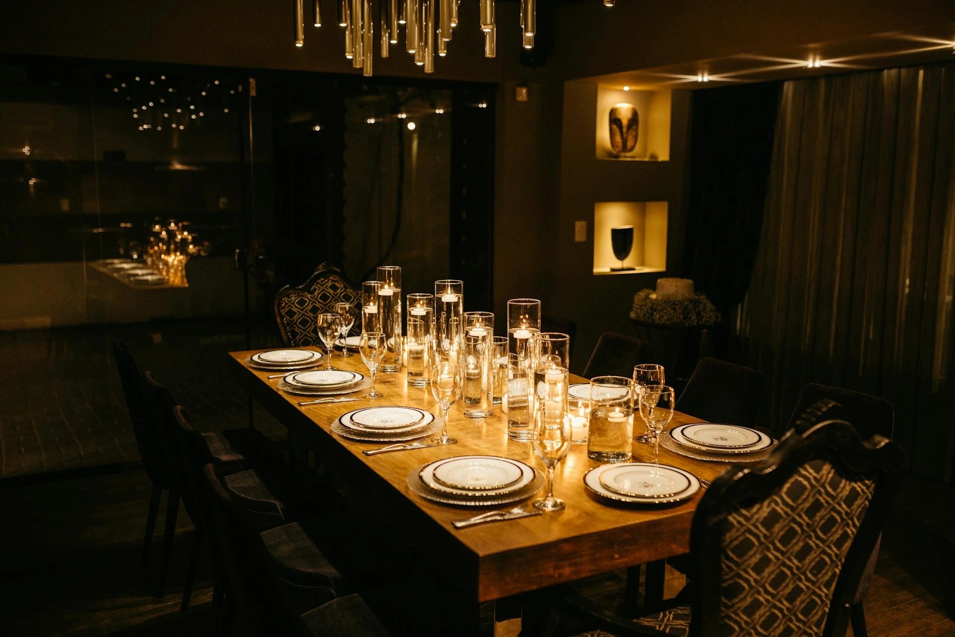 An elegant dining room set for a private, five-star dinner, representing the exclusive culinary experiences curated by Montclair Chef.