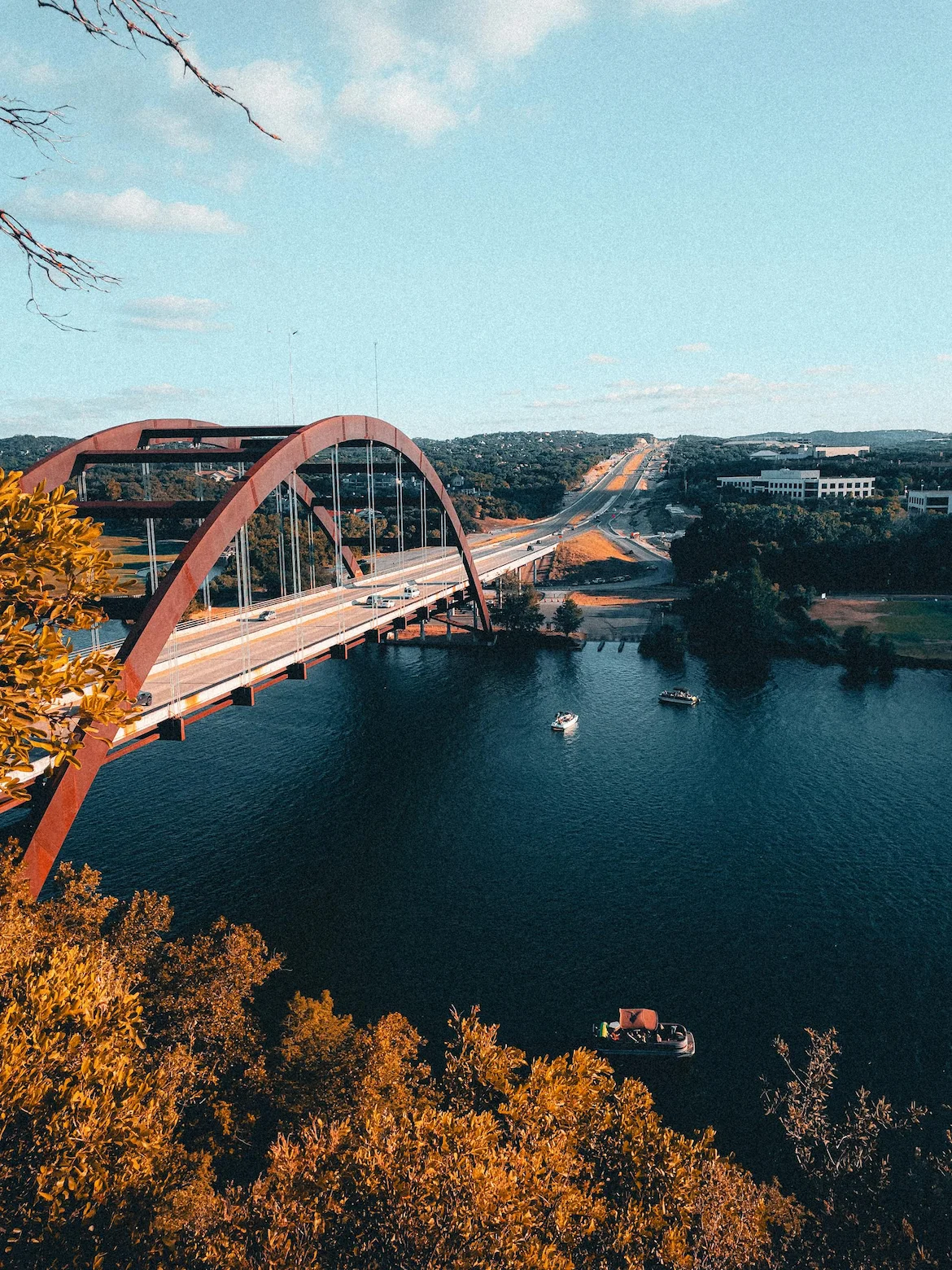 View of Lake Austin from the Pennybacker Bridge overlook, the cliffside neighborhood where many of our Austin UHNW clients hold their primary residences