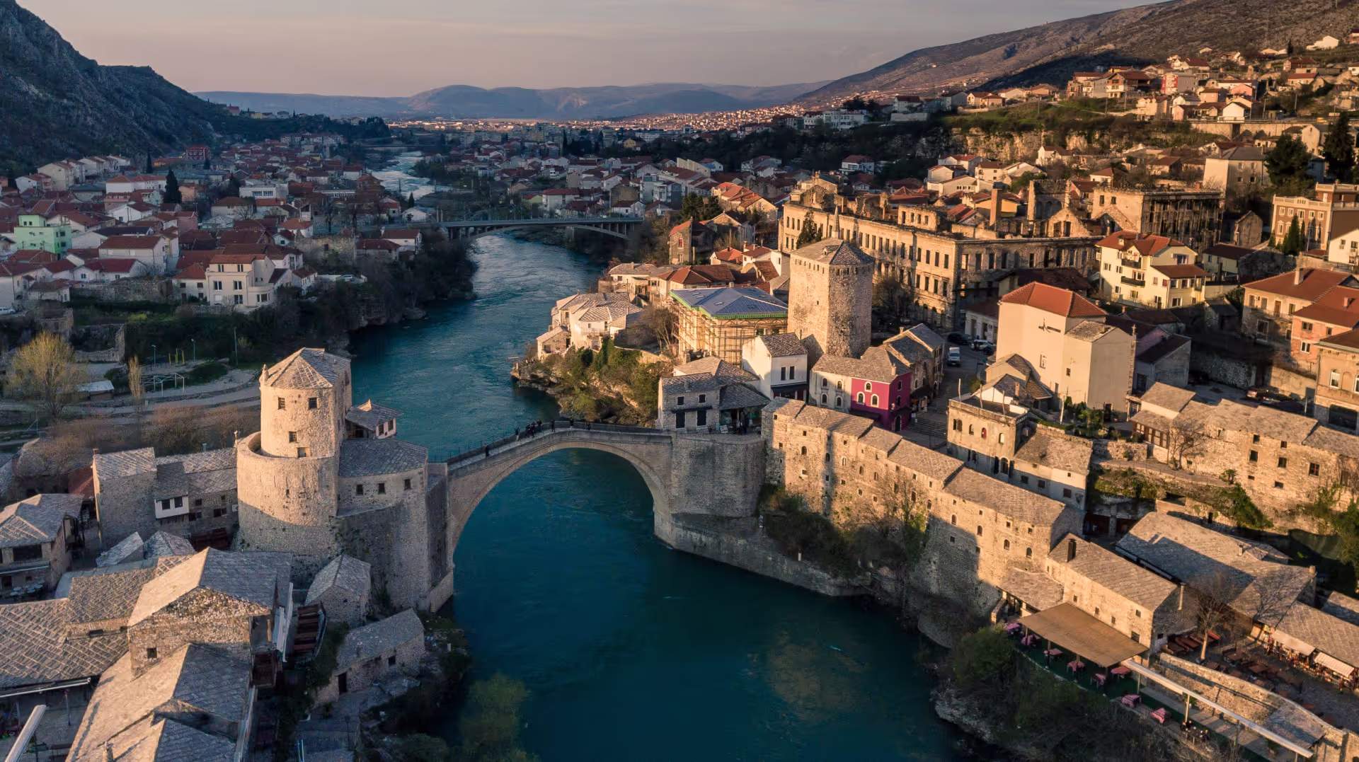 An aerial image of the capital of Bosnia and Herzegovina, Sarajevo. A view of the river with traditional bridges 
