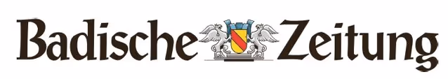 Logo der Badischen Zeitung mit zwei weiße Adler und einem Wappen in der Mitte.