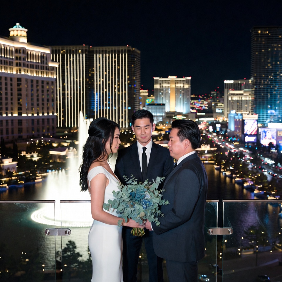 las vegas wedding officiant performing a private balcony ceremony for a couple at the cosmopolitan overlooking the las vegas strip