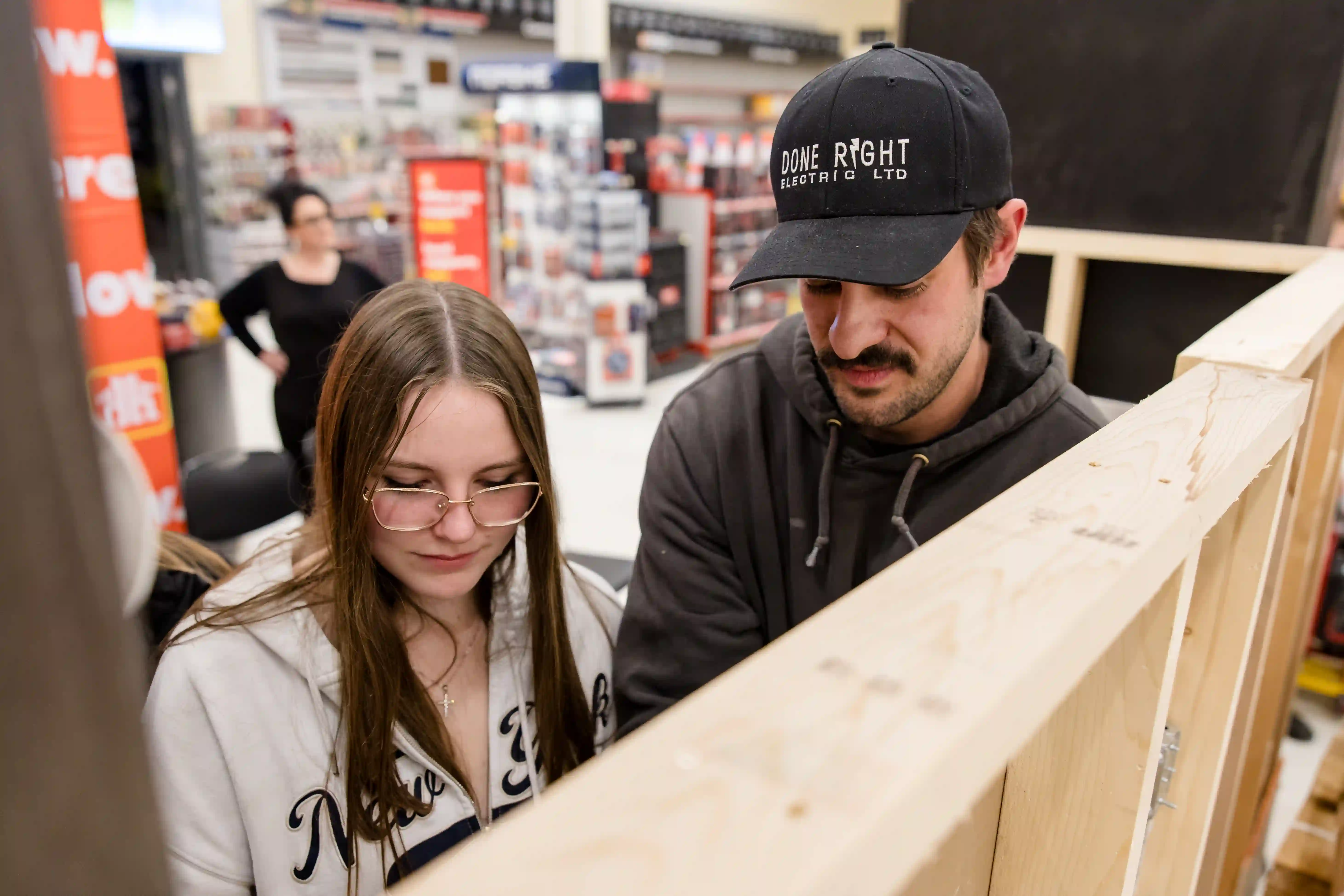 Heinen Group Hardware employee showing a customer