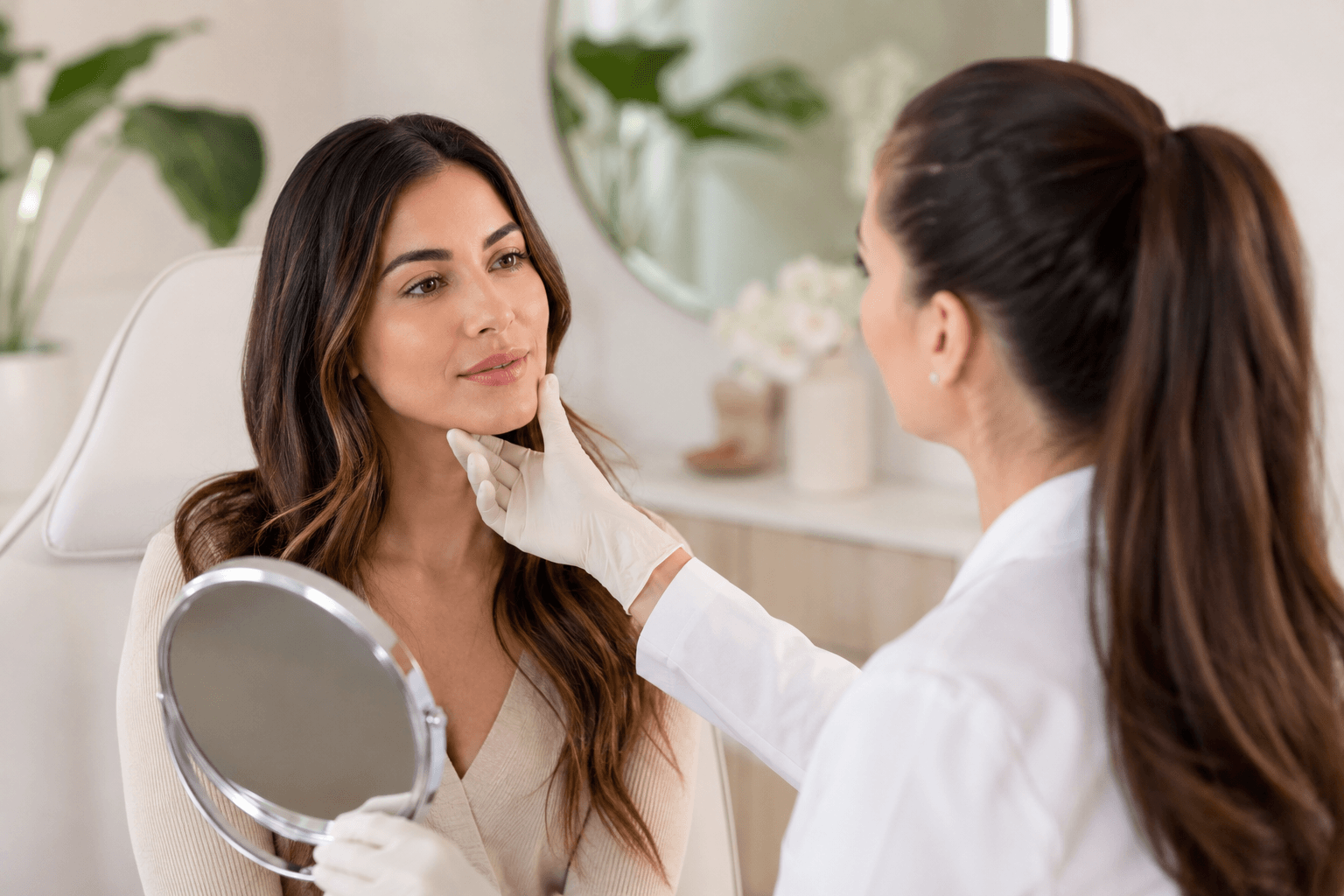 Woman consulting about dermal fillers in St. Petersburg, Florida clinic office