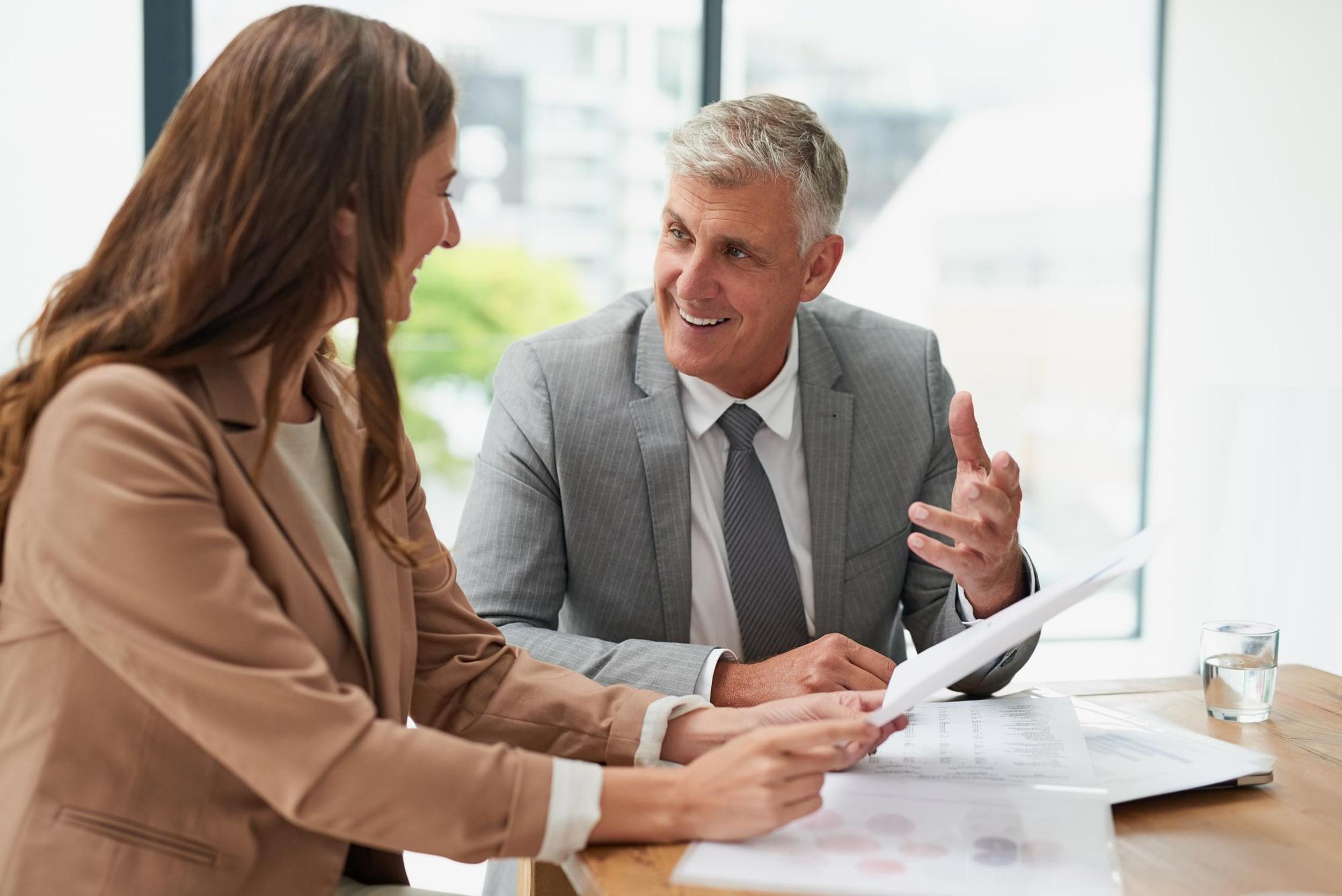 An accountant and client having a self-assessment tax meeting.