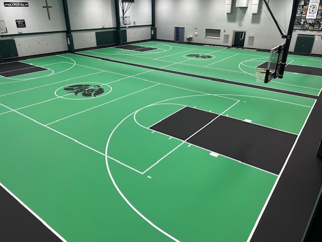 Badin High School synthetic green and black flooring. 